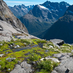 Glaciers in New Zealand's Fiordland once filled the valleys but have shrunk back to the mountain-tops since the last ice age ended 10,000 years ago.
